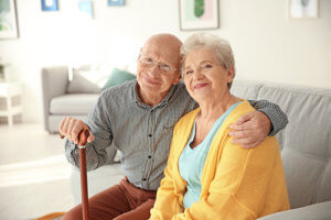 a couple is happy with senior living amenities